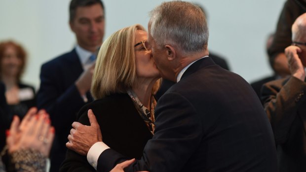 Australian Prime Minister Malcolm Turnbull kisses his wife Lucy during at the ceremony hosted by the German-Australian Chamber of Industry and Commerce.