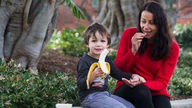 Anita Stone encourages her son Zac, 3, to eat healthy snacks.