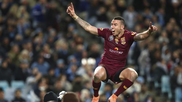 Not quite the match-winner: Maroons fullback Darius Boyd celebrates after scoring a late try.