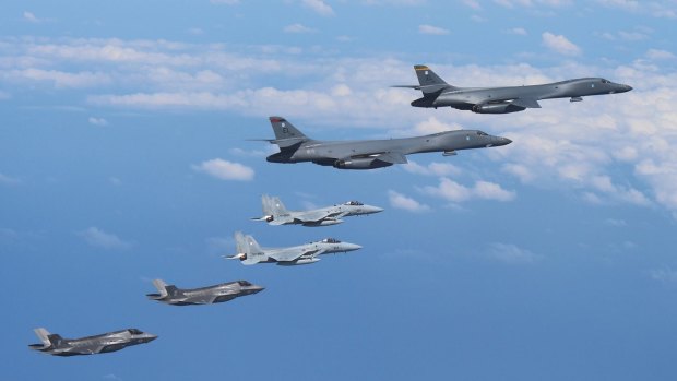 This photo, released by the US Pacific Command on Sept. 1, 2017, shows US Air Force B-1B strategic bombers and U.S. Marine Corps F-35B stealth jets flying over the Korean Peninsula.
