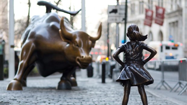 "Charging Bull" and "Fearless Girl" face off against each other in New York.