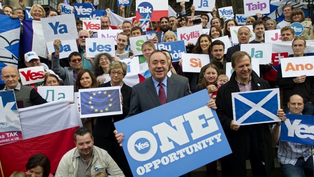 Campaign for yes: Scotland's First Minister Alex Salmond, backed by pro-independence supporters, lobbies for votes in Edinburgh.