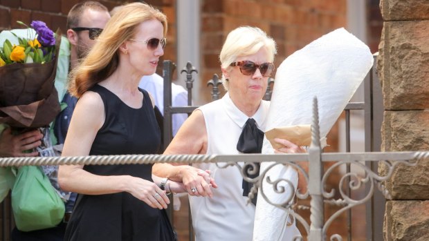 Gareth Morgan's sister Cydane and mother Orlis Morgan leave the funeral. 