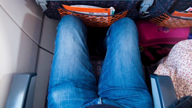 Flying is getting less comfortable for tall passengers.