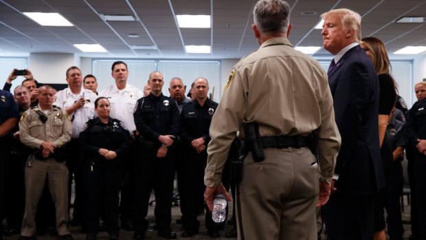 President Donald Trump meets with police first responders on Thursday.