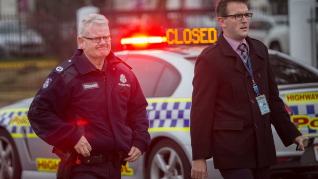 Assistant Commisioner Stephen Leane (left) at Carrick Drive in Tullamarine, where a fatal shooting took place in the early hours of Friday morning. 