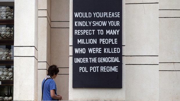 A visitor to the Choeung Ek Genocide Museum, also known as the Killing Fields.
 