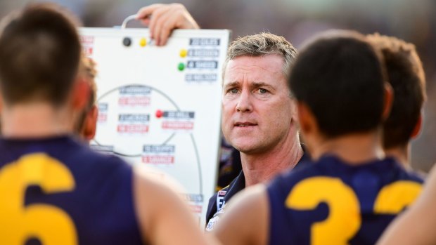 Adam Simpson addresses the team at quarter time during the round 2 match between the Eagles and St Kilda.