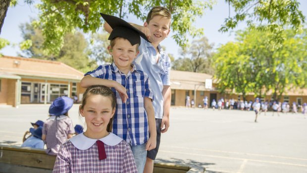 After graduating from The Shepherd Centre in Rivett where he has been receiving early intervention treatment to speak and listen more easily, Nate Korbl, five, will be joining his siblings Asha, 11, and Ryan, eight, at St John the Apostle Primary School in Florey.