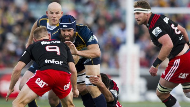 Brumbies flanker Scott Fardy charges into the Crusaders' defence.