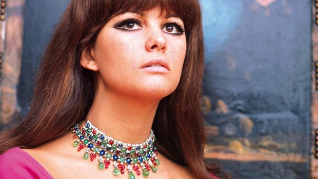 Tunisian-born Italian actress Claudia Cardinale featured in Vogue Italia wearing a Bulgari necklace and a bracelet (worn as a necklace) in 1966.