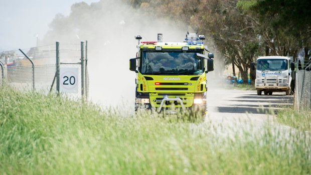 Firefighters at the scene of the Pialligo recycling plant fire last week.