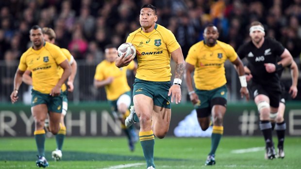 Runaway success: Israel Folau scores the Wallabies' first try in Dunedin against the All Blacks.