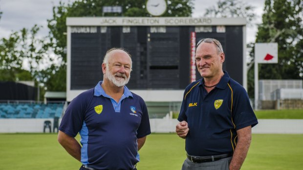Canberra umpires Bill Ruse  and Terry Keel.
