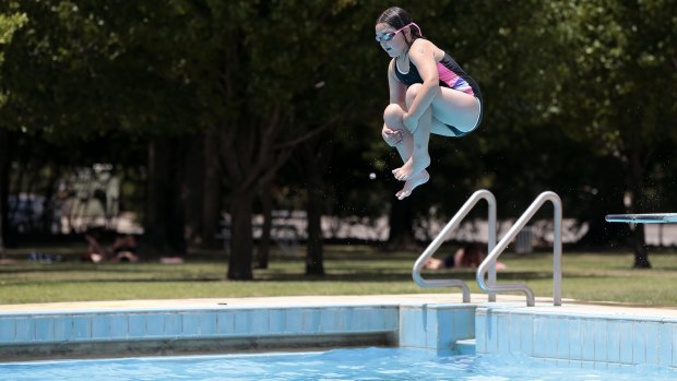 Eliza Chalmers, 8, of Wanniassa cooling off at Canberra Olympic Pool in Civic.