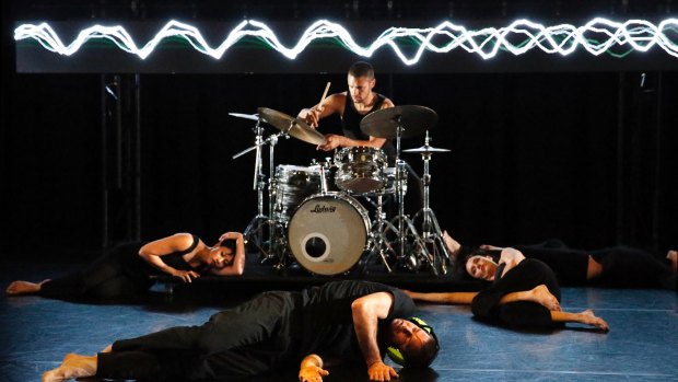 Drummer Myele Manzanza and dancers Elle Evangelista​, Timothy Ohl and Anna Seymour in Out of Earshot.