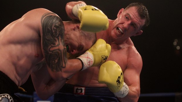 On the way up: Paul Gallen  subdues Randell Ray on Saturday night.