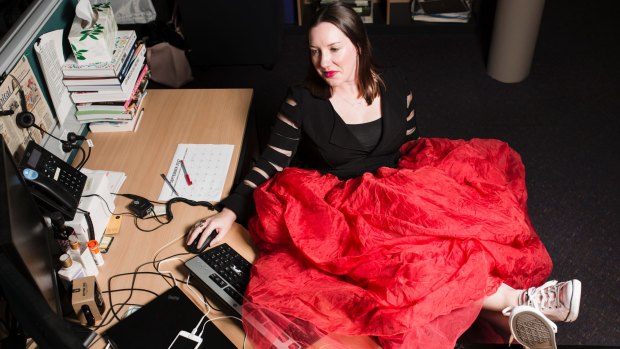 Working is problematic when your skirt is the size of a small couch.