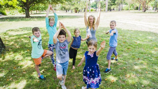 Blue Gum School at Hackett provides yoga classes for children. (Front from left), Toby Felton-McMahn, 7, and Lara Barnes 5. (behind from left), Sam Inglis 12, Ruby Martyn 11, Matilda Davies, 5, After School Care Coordinator Ruth Pickard, and Max Barnes, 9.