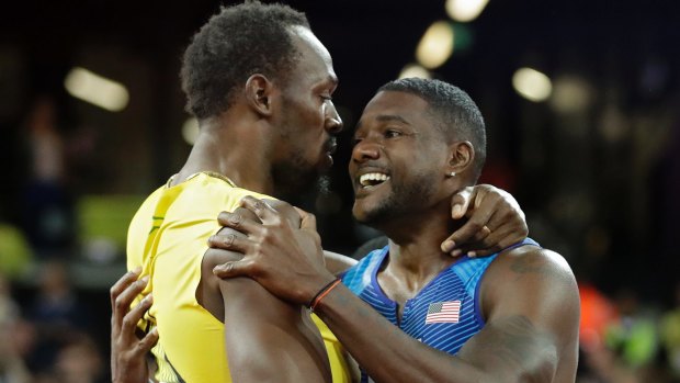Hero and... villain? Usain Bolt with Justin Gatlin.