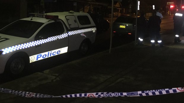 Police at the scene of a possible hostage situation at Haberfield.