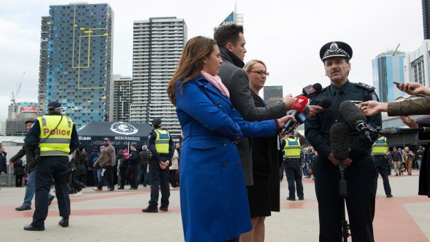 Victoria Police acting Chief Commissioner Tim Cartwright updates the media near Etihad Stadium on Sunday.