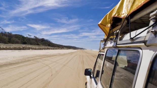 A woman who attacked a Fraser Island paramedic hasn't been picked up at police checkpoints.