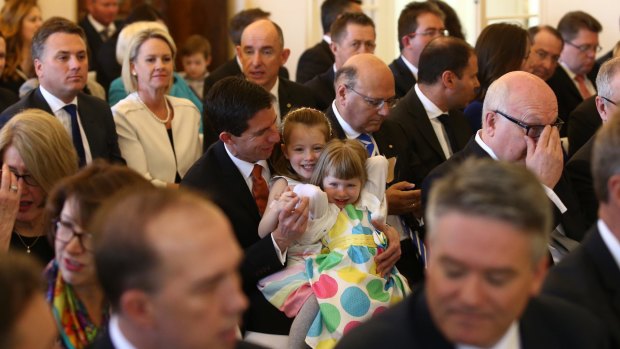 Senator Simon Birmingham with his daughters before he was sworn in as Education Minister.