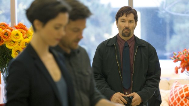 Joel Edgerton (right), with Rebecca Hall and Jason Bateman and in <i>The Gift</i>.