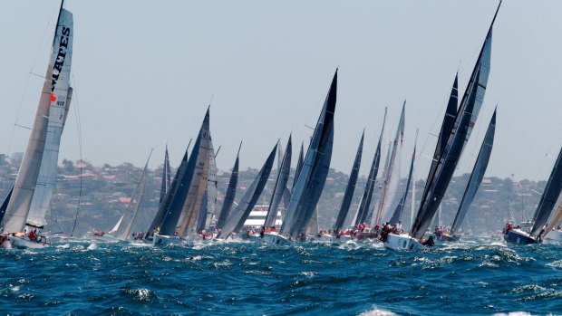 Yachts jostle for position at the start of the Sydney to Hobart.