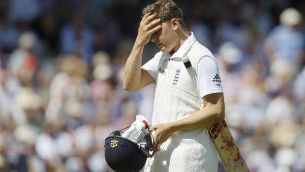 England's Gary Balance leaves the pitch after being caught by Peter Nevill off the bowling of Australia's Mitchell Marsh on the fourth day of the second Test at Lord's.