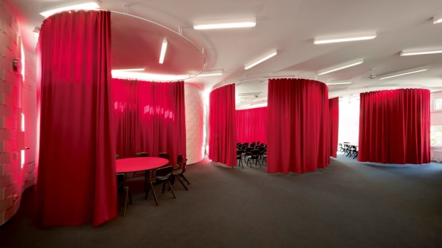 At Fitzroy High School, architects McBride Charles Ryan used heavy wool curtains to create small focused rooms.