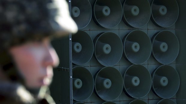 A South Korean soldier stands by the loudspeakers near the border area between South Korea and North Korea in Yeoncheon, South Korea, on Friday.