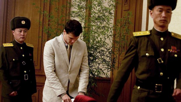American student Otto Warmbier arrives at the People's Cultural House in Pyongyang for a press conference.