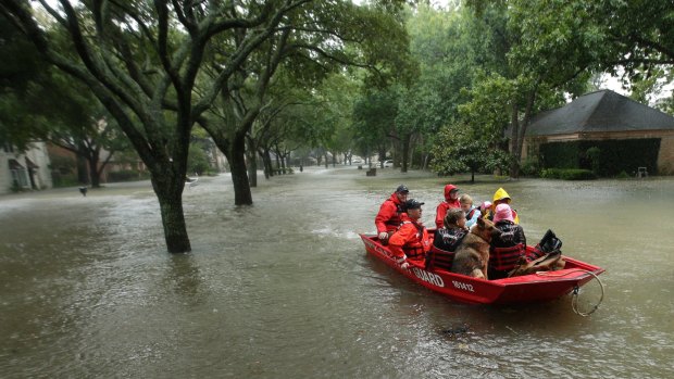 Police and Coast Guard teams have rescued some 2,000 people so far.