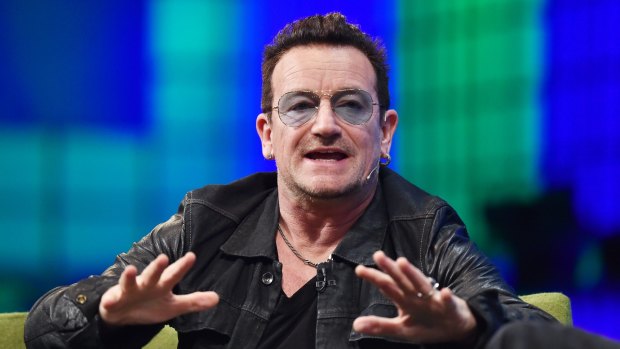 U2 frontman Bono takes the stage at the Dublin Web Summit.