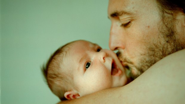 New fathers often have to balance being the primary source of family income with spending time with their new baby and supporting their partner.