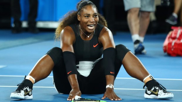 Serena Williams celebrates winning the Australian Open over her sister Venus.