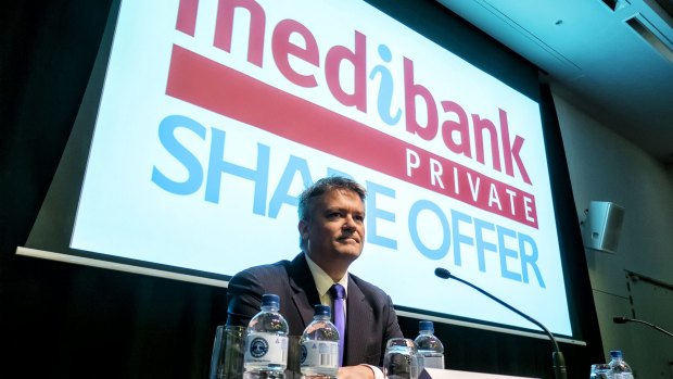 Laughing all the way to the bank: Finance Minister Mathias Corman at the Medibank share float.