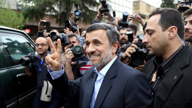 Former Iranian President Mahmoud Ahmadinejad arrives at the Interior Ministry to register his candidacy for the upcoming presidential elections in Tehran.