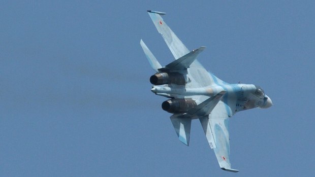 A Russian Sukhoi SU-30 fighter. In recent weeks, Russia has deployed more than two dozen fighter aircraft, attack helicopters and surface-to-air missile defence systems to a base in Syria, according to US officials.