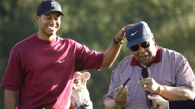Tiger Woods with his father, Earl, in 2004.