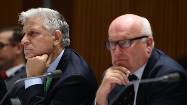 Attorney-General's Department secretary Chris Moraitis (left) with his minister, George Brandis, in Senate estimates in February.