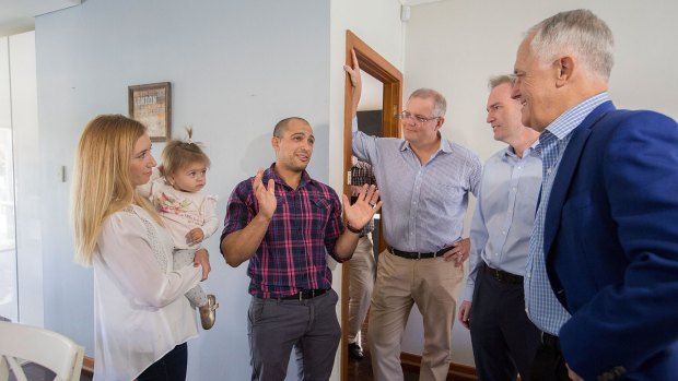 Kim and Julian Mignacca and 11-month-old daughter Addison talk to Malcolm Turnbull, Scott Morrison and local MP David Coleman about their home in Penshurst, Sydney.