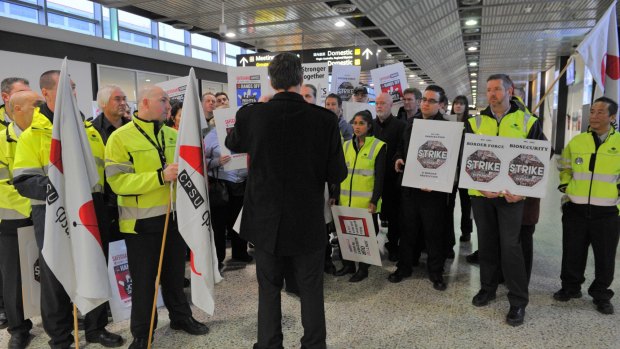 Union members in a stop-work meeting at Melbourne's international airport in 2015.