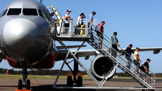 Australians have snapped up more than 200,000 half-price airfares on the first day of the government-subsidised sale.
