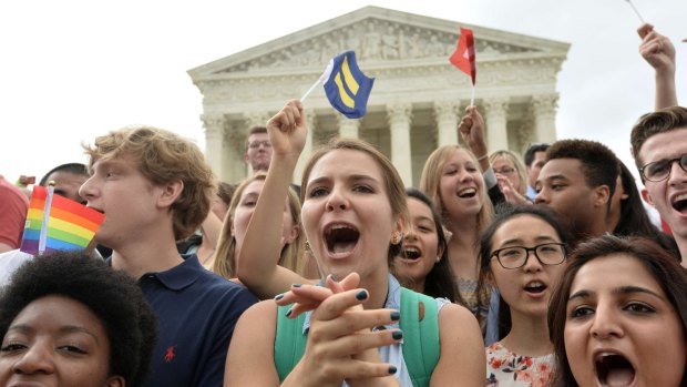 Gay marriage supporters celebrate outside the US Supreme Court in Washington, D.C. on Friday.