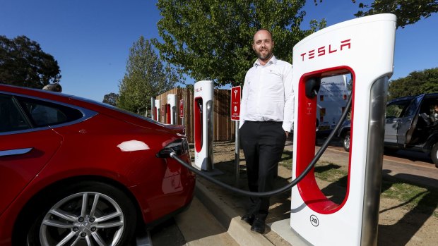 Tesla Supercharger program manager Evan Beaver at the charge station in Wodonga, Victoria.