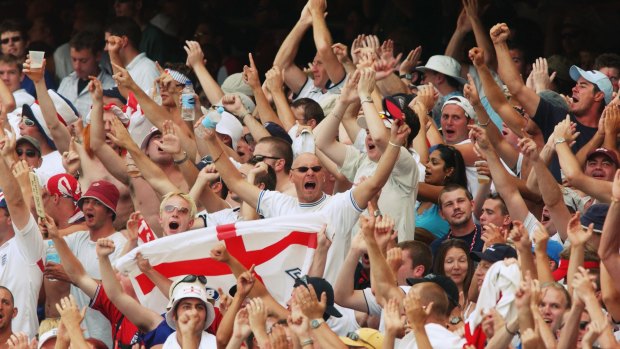 The Barmy Army cheers on the England team against Australia.