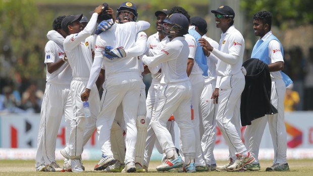 Sri Lanka celebrate the dismissal of Australia's Mitchell Marsh.